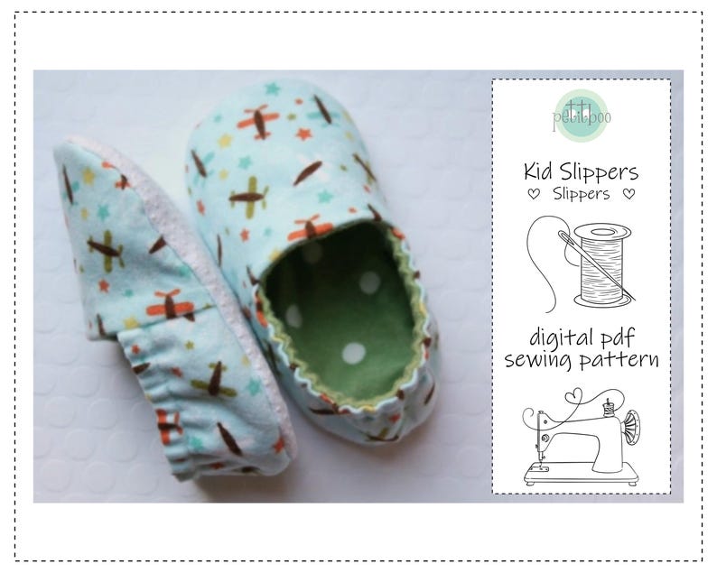 May include: A pair of kid's slippers with a light blue airplane and star pattern. The interior is green with white polka dots. The image also includes a digital PDF sewing pattern for the slippers.