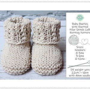 May include: A pair of beige knitted baby booties with a knotted pillar stitch cuff. The image includes a white card with text that reads "Baby Booties with Knotted Pillar Stitch Cuff Knitting Pattern". Sizes: Newborn, 0-3mo, 3-6mo, and 6-12mo.