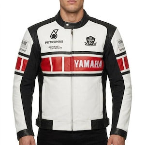 May include: A white, black, and red motorcycle jacket featuring the Yamaha logo, Petronas branding, and a 50th anniversary emblem. The jacket has a mandarin collar with a snap button, a full-length front zipper, and long sleeves with black panels.