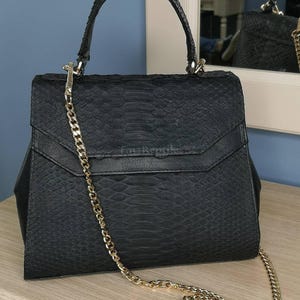 Borsa su misura in pelle di pitone: borsa a mano in pelle esotica nera.
