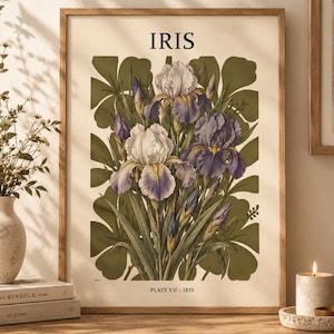 Peut inclure: Une impression d'art botanique encadrée représentant un bouquet d'iris violets et blancs avec un feuillage vert. Le mot IRIS est imprimé en noir en haut, et le texte PLATE VII - IRIS est imprimé en noir en bas sur fond crème.