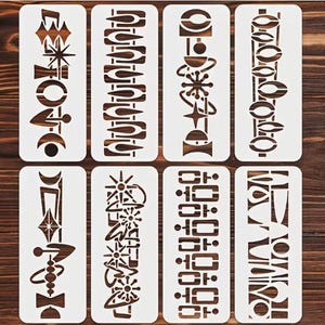 May include: Eight white plastic stencils with various geometric and abstract designs. The stencils are rectangular and feature cut-out patterns of stars, circles, and other shapes. The stencils are arranged on a wooden surface.