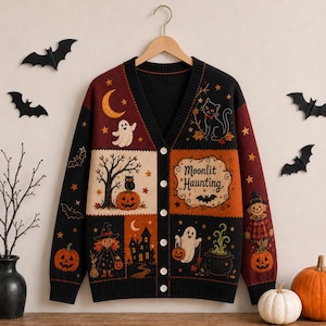 May include: A V-neck button-down cardigan featuring a patchwork design with Halloween motifs including a ghost, a black cat, a pumpkin, a witch, a haunted house, and a scarecrow. The text Moonlit Haunting is printed on an orange panel.
