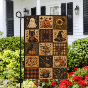 May include: A rectangular garden flag featuring a grid of fifteen squares with autumn and Halloween motifs, including a ghost, jack-o'-lantern, black cat, witch hat, crow, broom, cauldron, sunflowers, and plaid patterns in orange, black, and tan.