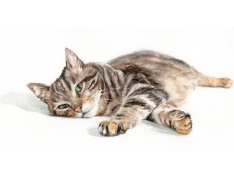 May include: Watercolor painting of a tabby cat lying on its side with its paws outstretched. The cat has green eyes and a white patch on its chest.