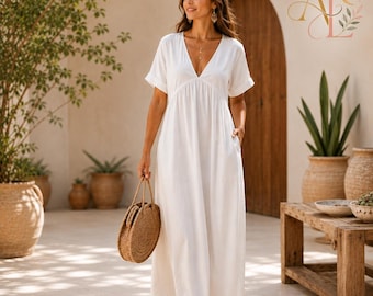 Abito lungo boho in cotone e lino, con scollo a V, perfetto per vacanze al mare o in resort.