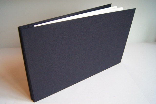 Dunwell Binder with Plastic Sleeves 24-Pocket - Presentation Book 8x10  (Black)