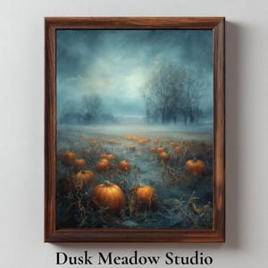 May include: A framed wall art print titled Dusk Meadow Studio featuring a landscape of orange pumpkins scattered across a misty, dark field under a moody, overcast sky with bare trees in the background, all enclosed in a dark brown wooden frame.