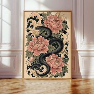 May include: A vertical rectangular wall art print featuring a black snake coiled among large, light pink peony flowers and green leaves. The background includes stylised cream-coloured waves and dark green accents, all enclosed within a thin wooden frame.