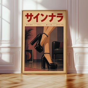 Könnte beinhalten: Ein gerahmter Wandkunstdruck mit einer Illustration von Beinen, die schwarze Plateau-High-Heels mit Knöchelriemen tragen. Oben auf dem Druck befindet sich der rote japanische Text "サインナラ" sowie der Text "東京の美学 | デザイン | 暮らしと紙 | JAPAN, 1944".
