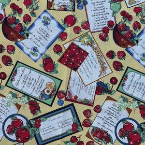 May include: A yellow fabric with a repeating pattern of vintage recipe cards, handwritten text, and illustrations of fresh strawberries, cherries, blueberries, and grapes. The design features various culinary instructions and fruit motifs.