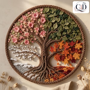 May include: A circular wall hanging featuring a crocheted tree of life design. The tree is divided into four seasons: pink blossoms for spring, green leaves for summer, orange and red maple leaves for autumn, and white snow for winter.