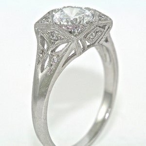 14kt White Gold and Diamond Art Deco Design Engagement RIng with a 1.00ct White Sapphire Center