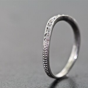 Platinum and Diamond Curved Hand Engraved Wedding Band