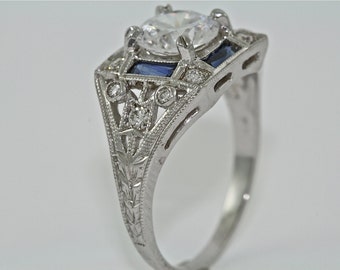 18kt White Gold Diamond and Blue Sapphires Art Deco Design Engagement Ring with 1.00ct White Sapphire Center