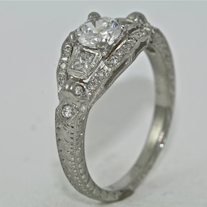 Platinum and Diamond Classic Art Deco Design Hand Engraved Engagement Ring with a .50ct White Sapphire Center