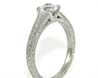 Platinum and Diamond Solitaire Hand Engraved Engagement Ring with .54ct Moissanite