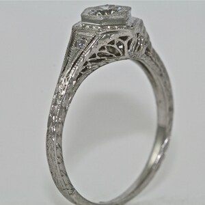 14kt White Gold and Diamond Art Deco Design Hand Engraved Engagement RIng with a .20ct White Sapphire Center