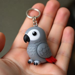 Llavero de loro gris africano, figura de ave realista, accesorio impreso en 3D y pintado a mano.