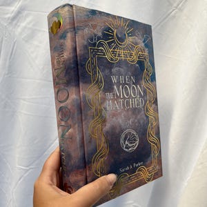 When the Moon Hatched by Sarah A. Parker rebind, hard cover with soft touch laminate