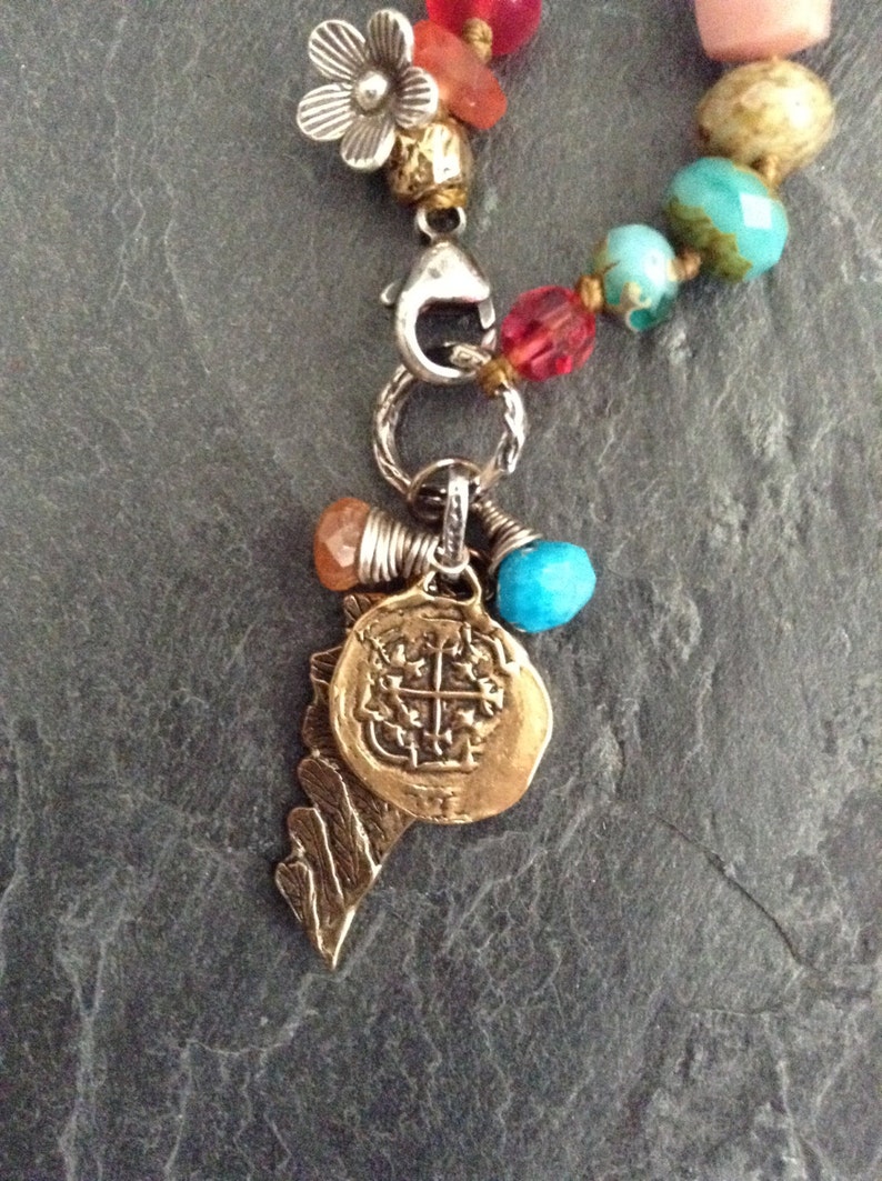 Charm knotted necklace Spanish Reale coin and wing layering Etsy
