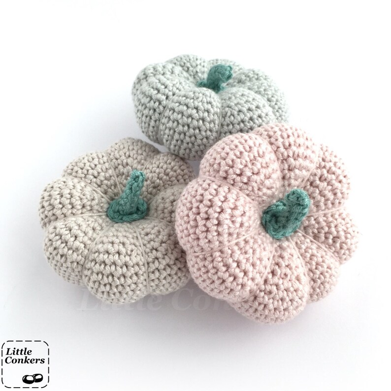 Crocheted pumpkins in pastel colours