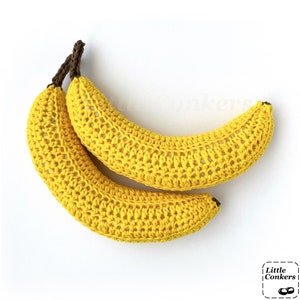 Two realistic crocheted bananas.