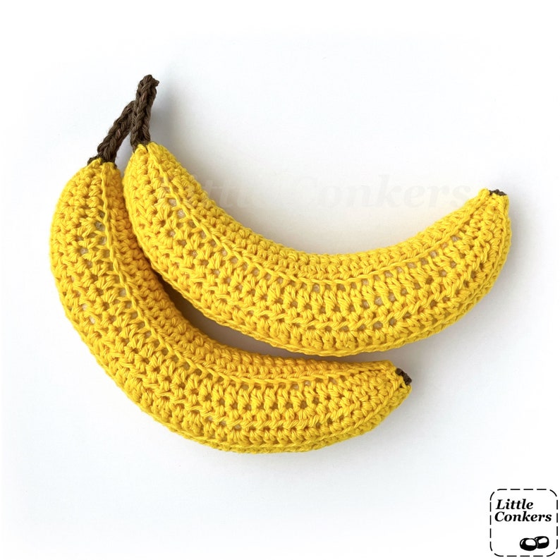 Two realistic crocheted bananas.