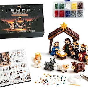 May include: The Nativity Bead Craft Kit includes a black box with a nativity scene illustration, a clear plastic organiser filled with multi-coloured beads, a printed instruction sheet, a finished bead nativity set, clear string, and metal tweezers.