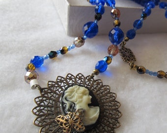 Antique Brass Pendant, Lady's Necklace, Resin Cameo, Antique Brass Filigree, Cobalt Blue, Browns, Peach Beads, 22" long, Great Gift