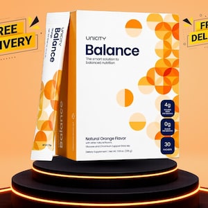 May include: A white and orange box of Unicity Balance dietary supplement drink mix with a single packet standing beside it. The packaging features orange circular patterns, text stating Natural Orange Flavor, 4g fibre, 0g sugar, and 30 packets.