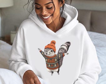 Pobierz cyfrową wersję „Feature Flying Squirrel”, sublimację PNG, plik do druku DTF, wiewiórkę w pomarańczowej czapce i jesiennym swetrze