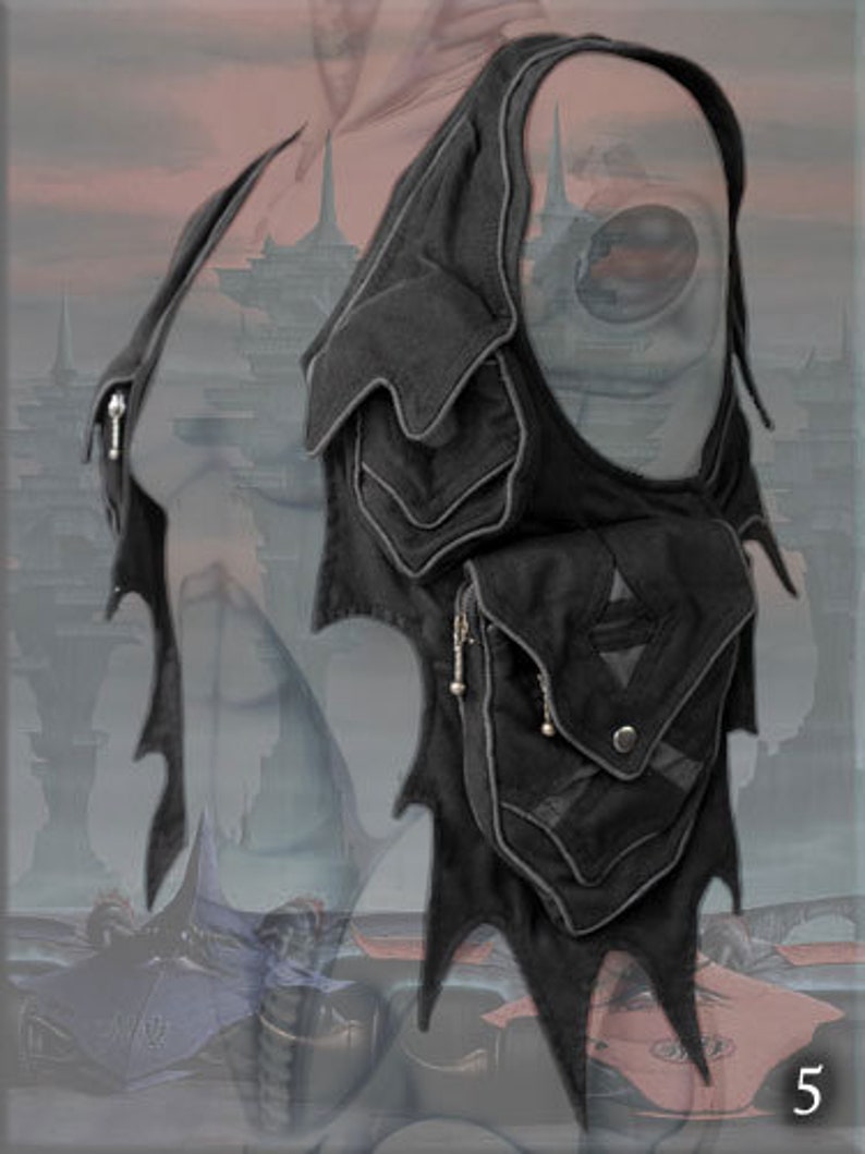 May include: Black leather vest with multiple pockets and a jagged, wing-like design. The vest has a zipper closure and a silver chain detail.