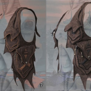 May include: A brown leather vest with multiple pockets and a fringed design. The vest has a tribal-inspired pattern and is decorated with metal accents.