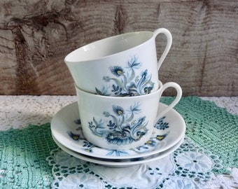 Vintage Pair of Limoges Porcelain Cup and Saucers, Fine White China with Blue/ Yellow Floral Pattern. Stamped Limoges France.