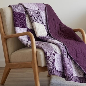 Modern purple lavender quilt pattern with feather and swirl quilting design