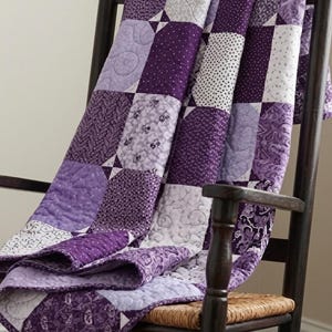 Handmade patchwork throw quilt in purple lavender floral and polka dot prints