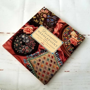Hardcover book full of beautiful needlepoint patterns tapestry and beadwork by Julia Hickman