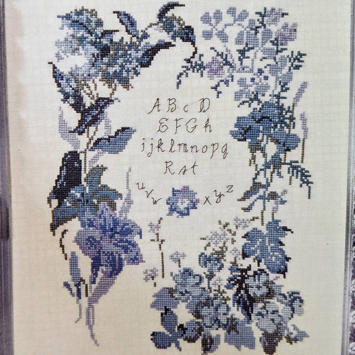 Colourful Bookshelf Cross Stitch Pattern – Midnight Blue