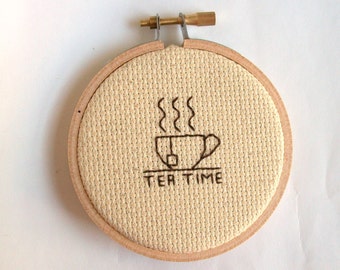 Tea Time mini cross stitch -- completed 3 inch round cross stitch about what time it is