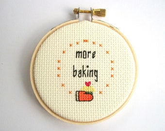 More Baking mini cross stitch -- completed 3 inch round cross stitch about baking more and eating cupcakes