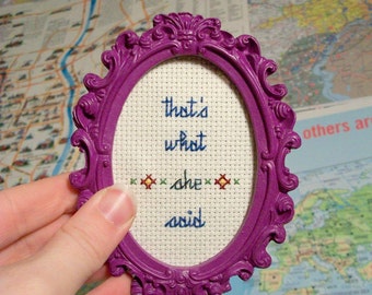 That's What She Said Mini -- Dark Blue cross stitch with flower motif in your choice of ornate frame or wood hoop