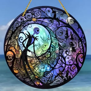 May include: A circular stained glass-style hanging ornament featuring a tall, slender skeletal figure in a pinstriped suit standing before a large moon. The design includes intricate black outlines, purple and blue hues, and small pumpkin motifs.