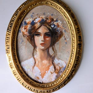 Ritratto di una donna romantica. Dipinto originale e cornice ovale antica. Luglio
