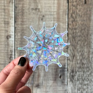 Holografisk spindelnätsklistermärke, spindelnäts-halloween-klistermärke, halvtransparent spindelklistermärke, glansigt vinylklistermärke, häxig laptop-dekal