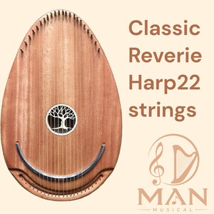Op de afbeelding: Een ovaalvormige houten harp met 22 snaren en een rond klankgat met een boomvormige uitsnede. Het instrument toont de tekst Classic Reverie Harp22 strings en een logo met de tekst MAN MUSICAL en een harpicoon.