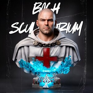 May include: A bust of a bald character wearing a white hooded cloak with a red cross emblem on the chest, secured by a metallic chain. The base features the Assassin's Creed logo surrounded by a glowing blue digital effect and the text BACH SCULPTORIUM.