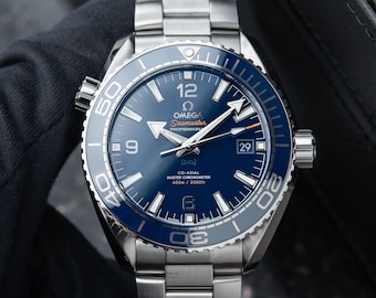 Reloj Omega Seamaster Planet Ocean 600 M Diver vintage 12/2023 con brazalete de acero y cerámica azul 215.30.44.21.03.001