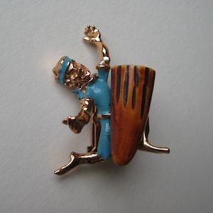 Man Drum Dancer Bakelite Blue Yellow Brooch Pin Vintage Gold Tone Enamel Paint Charles Worth