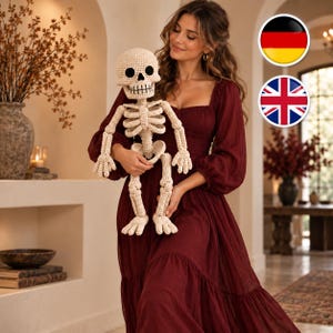 May include: A cream-colored crocheted skeleton figure featuring a round skull with black eye sockets and a stitched mouth, a rib cage, articulated arms, and legs with defined feet. The skeleton is constructed from yarn with visible stitches.